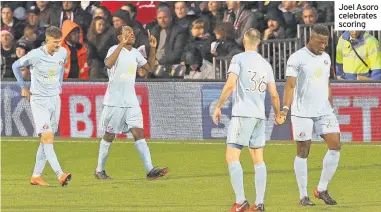  ??  ?? Joel Asoro celebrates scoring