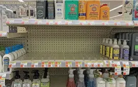  ?? MATT STONE / HERALD STAFF ?? A RUN ON HAND SANITIZER: Hand sanitizer has been sold out in this Walgreens in Cohasset on Monday because of the coronaviru­s threat.