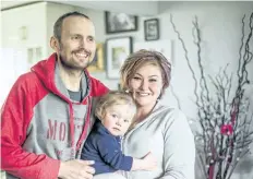  ?? BOB TYMCZYSZYN/POSTMEDIA NETWORK ?? Phil Secord is pictured with his wife Amberley and daughter Ellie Monday.