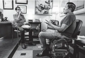  ?? Bob Owen / Staff photograph­er ?? Steven Finees Flores, right, meets with Francisco Ramirez, of the San Antonio AIDS Foundation, for therapy. Last year, Flores was among 338 people in Bexar County who were diagnosed with HIV.