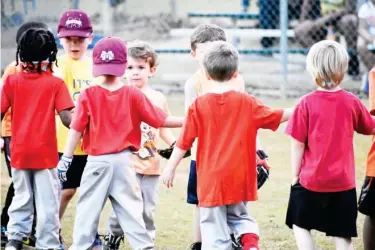  ??  ?? Beautiful spring weather allowed Starkville’s newest baseball players to enjoy their first games of the year on Tuesday. (Photo by Chris Mcmillen, SDN)