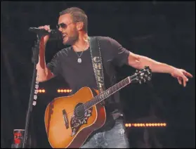  ?? RICK DIAMOND / GETTY IMAGES ?? ABOVE: Musician Eric Church, shown during the 2016 CMA Festival in Nashville, will perform Feb. 16 at the Infinite Energy Center in Duluth.