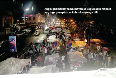  ??  ?? Ang night market sa Dakbayan sa Baguio diin mapalit ang mga panapton sa kubos kaayo nga bili.