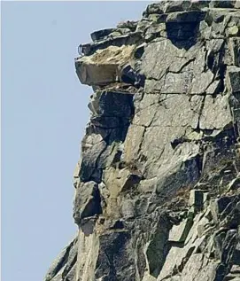  ?? JIM COLE/AP FILE PHOTO ?? The remaining rock formation after the Old Man of the Mountain collapsed in 2003.