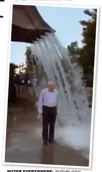  ??  ?? water everywhere: McGrath doing the ice bucket challenge with a digger in 2014