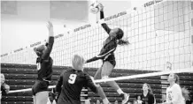  ?? MAX FAY/STAFF PHOTOGRAPH­ER ?? Blake Hollis, hitting against Oviedo’s Ally Kissenbert­h (10) and Madison Cook (9) last week, leads West Orange in blocks.