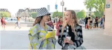  ?? Netflix ?? EMILY (Lily Collins) and Petra (Daria Panchenko) in the now controvers­ial shopliftin­g scene on Emily In Paris.