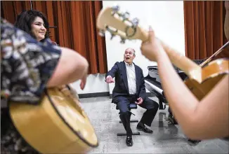  ?? AMANDA VOISARD / AMERICAN-STATESMAN ?? Ezekiel “Zeke” Castro, 78, leads practice Wednesday for Sunday’s spring concert at the University of Texas’ Butler School of Music. Castro, lecturer and director of the UT mariachi ensemble, is set to retire as director this spring. He became the first...