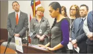  ?? Emilie Munson / Hearst Connecticu­t Media ?? Sanna Dilawar, a victim of domestic violence who was arrested along with her abuser after reporting the abuse to the police, speaks at the Capitol in Hartford on Friday.