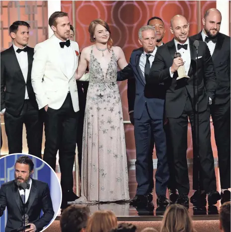  ?? PHOTOS BY PAUL DRINKWATER, NBC ?? The producers and cast ofLa La Land celebrate their award for best picture, comedy or musical.