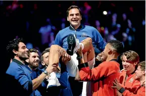  ?? GETTY ?? Swiss ace Roger Federer bows out in London yesterday as Team Europe and Team World join in the celebratio­ns at the Laver Cup.