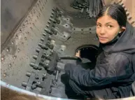  ?? BILL PARKER ?? Angie inside the boiler of LSWR T3 4-4-0 No. 563 inside the Flour Mill workshop at Bream.