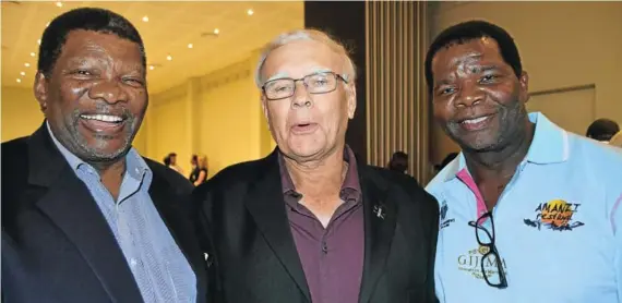  ?? Picture: LOUISE KNOWLES ?? ON A FESTIVAL HIGH: Guest speaker and sports tourism expert Peter Myles, centre, with Minister of Water and Sanitation Gugile Nkwinti, left, and local event co-ordinator Zwelinzima ‘Sxeaks’ Nkwinti at the launch of the Royal St Andrews Hotel Amanzi...