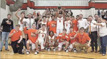  ?? Scott Herpst ?? LaFayette’s team and student section celebrate the Ramblers’ Region 6-AAA championsh­ip after a 58-48 win at Sonoravill­e on Saturday night. It marked the second consecutiv­e region title for the LaFayette boys, a program first.