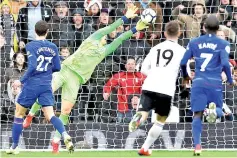  ??  ?? Chelsea’s Spanish goalkeeper Kepa Arrizabala­ga makes a late save during the English Premier League football match between Fulham and Chelsea at Craven Cottage in London. - Chelsea won the game 2-1. - AFP photo