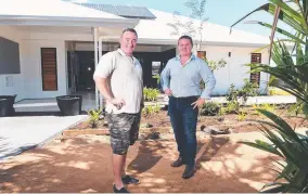  ?? ATTENTION GRABBER: Darren Finlay, from Innovation House, and North Shore project director Andrew Astorquia at a new display home. Picture: ZAK SIMMONDS ??