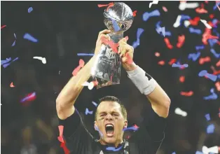  ?? TIMOTHY A. CLARY/AFP/GETTY IMAGES ?? You couldn’t blame any NFL contender for inking 43-year-old Tom Brady, the winningest playoff QB of all time, to a one-year deal if he can win them a championsh­ip, Scott Stinson writes.