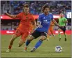  ?? NHAT V. MEYER — BAY AREA NEWS GROUP ?? San Jose Earthquake­s' Cade Cowell (44) controls the ball against Houston Dynamo FC'S Griffin Dorsey (25) in the second half at Paypal Park in San Jose on July 17, 2022.