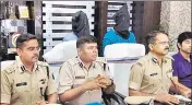  ?? HT PHOTO ?? Senior police officials at a press conference in Khunti, Jharkhand on Sunday. The two arrested accused are seen in the back.