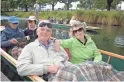  ??  ?? Leo Damkroger and Nancy Plencner punting on the Avon River in Christchur­ch, New Zealand.