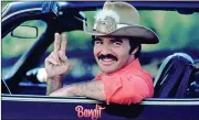  ?? Contribute­d photo ?? Burt Reynolds as perhaps his most famous character, The Bandit, from the 1977 classic “Smokey and the Bandit.”