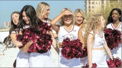  ?? ?? Razorback cheerleade­rs arrive at the beach.