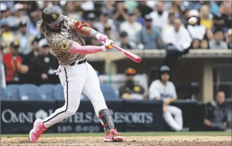  ?? MIKE MCGINNIS/AP ?? SAN DIEGO PADRES’ JOSE ALFARO game on Sunday in San Diego. hits a three-run walkoff home run against the Miami Marlins during the ninth inning of a