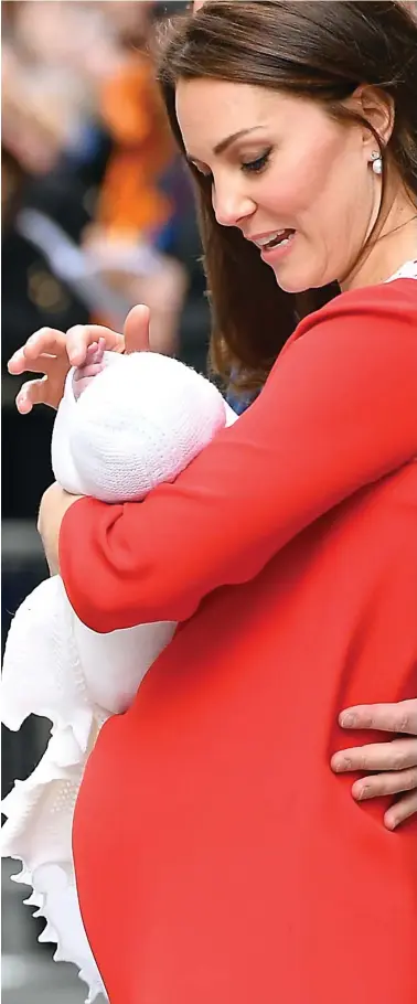  ??  ?? A mother’s touch: The pair appeared six hours and 50 minutes after the prince’s birth