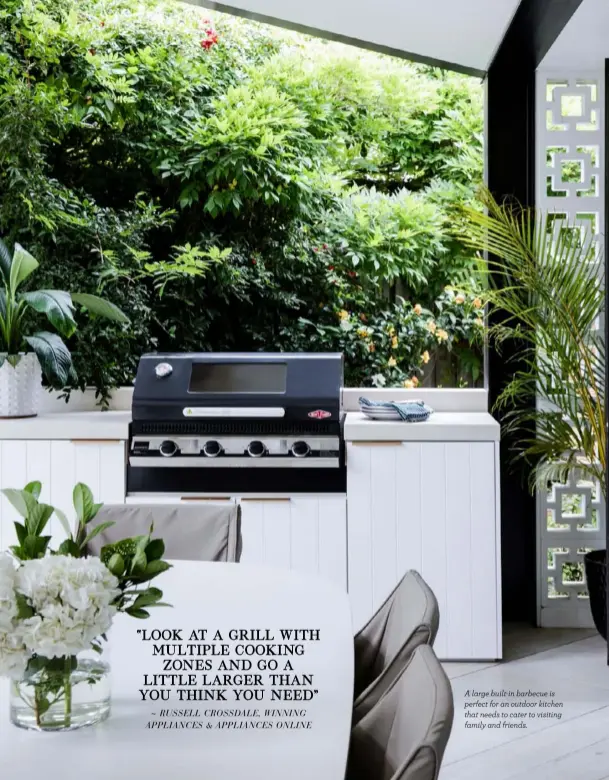  ??  ?? A large built-in barbecue is perfect for an outdoor kitchen that needs to cater to visiting family and friends.