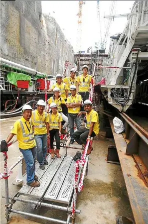  ??  ?? all ready to do Malaysia proud, but more importantl­y, this is the beginning of the creation of a pool of talent conversant in undergroun­d work, especially in bored tunneling. This is MMC-Gamuda’s undergroun­d team inside the Cochrane launch shaft, where...