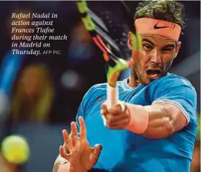  ?? AFP PIC ?? Rafael Nadal in action against Frances Tiafoe during their match in Madrid on Thursday.