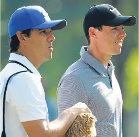  ?? Picture: Getty. ?? Rory McIlroy and new caddy Harry Diamond.