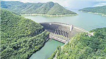  ?? ?? The Bhumibol Dam in Tak province is one of Egat’s six hydropower facilities for which GUT 1 rates apply.