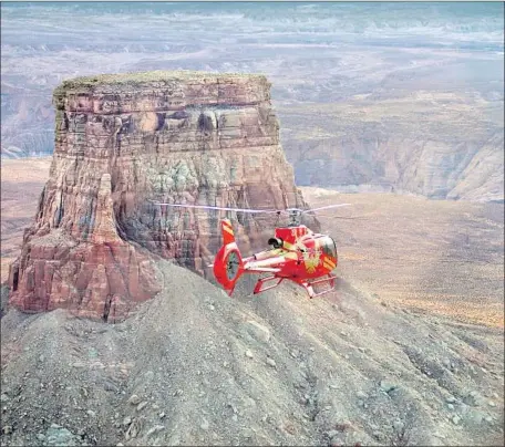  ?? Gary Ladd Papillon Grand Canyon Helicopter­s ?? THE ONLY WAY to land on Tower Butte, on Navajo land near Page, Ariz., is with a helicopter tour such as those offered by Papillon.