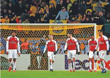  ?? Rex Features ?? Arsenal players react after conceding the goal to BATE Borisov during Thursday’s Europa League encounter. The return leg at Emirates Stadium will be played on Thursday next week.