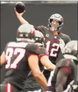  ?? Dirk Shadd / TNS ?? Tampa Bay Buccaneers quarterbac­k Tom Brady drops back to pass against the Atlanta Falcons on Sunday.