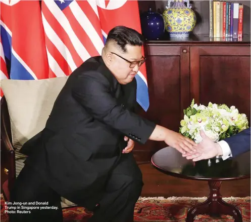  ??  ?? Kim Jong-un and Donald Trump in Singapore yesterday. Photo: Reuters