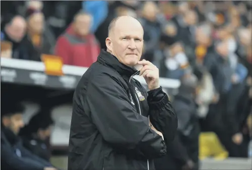  ?? PICTURE: JONATHAN GAWTHORPE ?? MUCH TO PONDER: Bradford City manager Simon Grayson’s initial contract with the club only takes him to the end of the season.