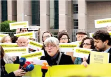  ?? AP ?? Demonstrat­ors protest before the trial of human rights activists in Istanbul.