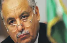  ?? Reuters; NNA ?? Top, the explosion that devastated Beirut was blamed on the country’s politician­s, who many consider corrupt. Above, judge Fadi Sawan was removed from the investigat­ion after a request filed by two former ministers he indicted