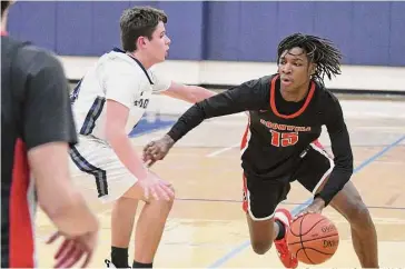  ?? Pete Paguaga/Hearst Connecticu­t Media ?? Cromwell’s Victor Payne scored 68 points in two games last week.