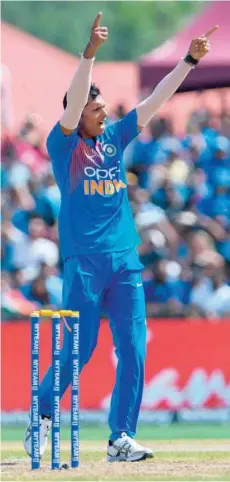  ??  ?? Navdeep Saini of India celebrates the dismissal of Nicholas Pooran of West Indies during the first T20I match in Fort Lauderdale, Florida. — AFP