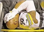  ?? GETTY ?? Steelers linebacker Ryan Shazier gets carted off field with back injury Monday in night of big hits and gruesome injuries against Bengals.