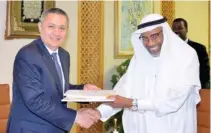  ??  ?? Uzbekistan's First Deputy Prime Minister and Minister of Finance Rustam Azimov and IDB Group President Ahmed Mohamed Ali exchange documents after signing the deal in Jeddah.