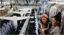  ?? DAVID RITCHIE ?? PARENTS and children flocked to School & Leisure in Rondebosch, Western Cape, to buy school clothes, which helps retailers to have a good start in turnover of their goods in the New Year. | African News Agency (ANA)
