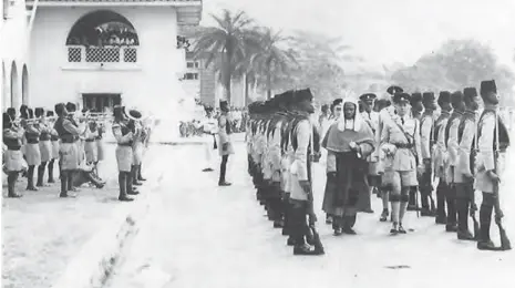  ??  ?? Justice Dadi Onyeama inspecting guard of honour at the Supreme Court in Lagos in 1962