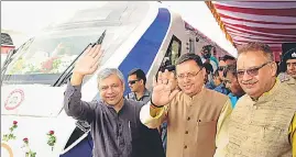  ?? HT PHOTO ?? Railways minister Ashwini Vaishnaw and CM Dhami during the flag-off ceremony of Vande Bharat Express, in Dehradun. (Below) PM Modi flagging off the train via video conferenci­ng .