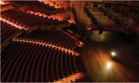  ?? Photograph: Mark Gambino/Arts Centre Melbourne ?? A ghost light burns on stage at the Arts Centre Melbourne’s Hamer Hall during the coronaviru­s pandemic. The venue had planned to reopen in late June.