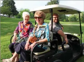  ??  ?? Liz Harmon of Wayne and Marie Lambeck-Malvern hitch a lift to the given by Michael Candelori of Lansdowne.