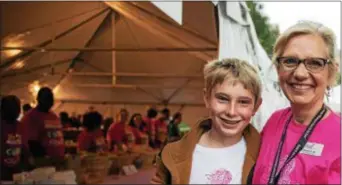  ??  ?? Sloane Six and her son, Skylar, volunteeri­ng for the Komen Philadelph­ia Race for the Cure during the 25th Anniversar­y event in 2015.